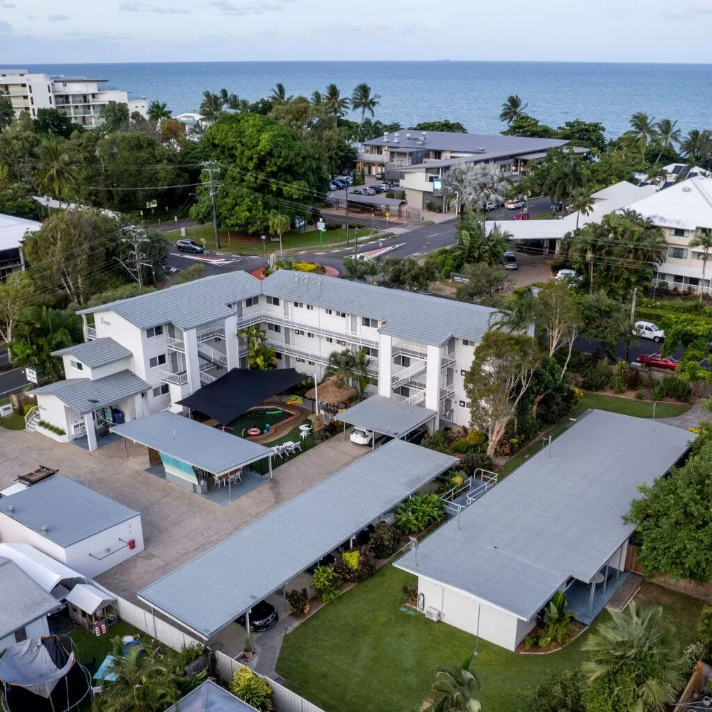 Cocos Resort buildings and pool at Trinity Beach