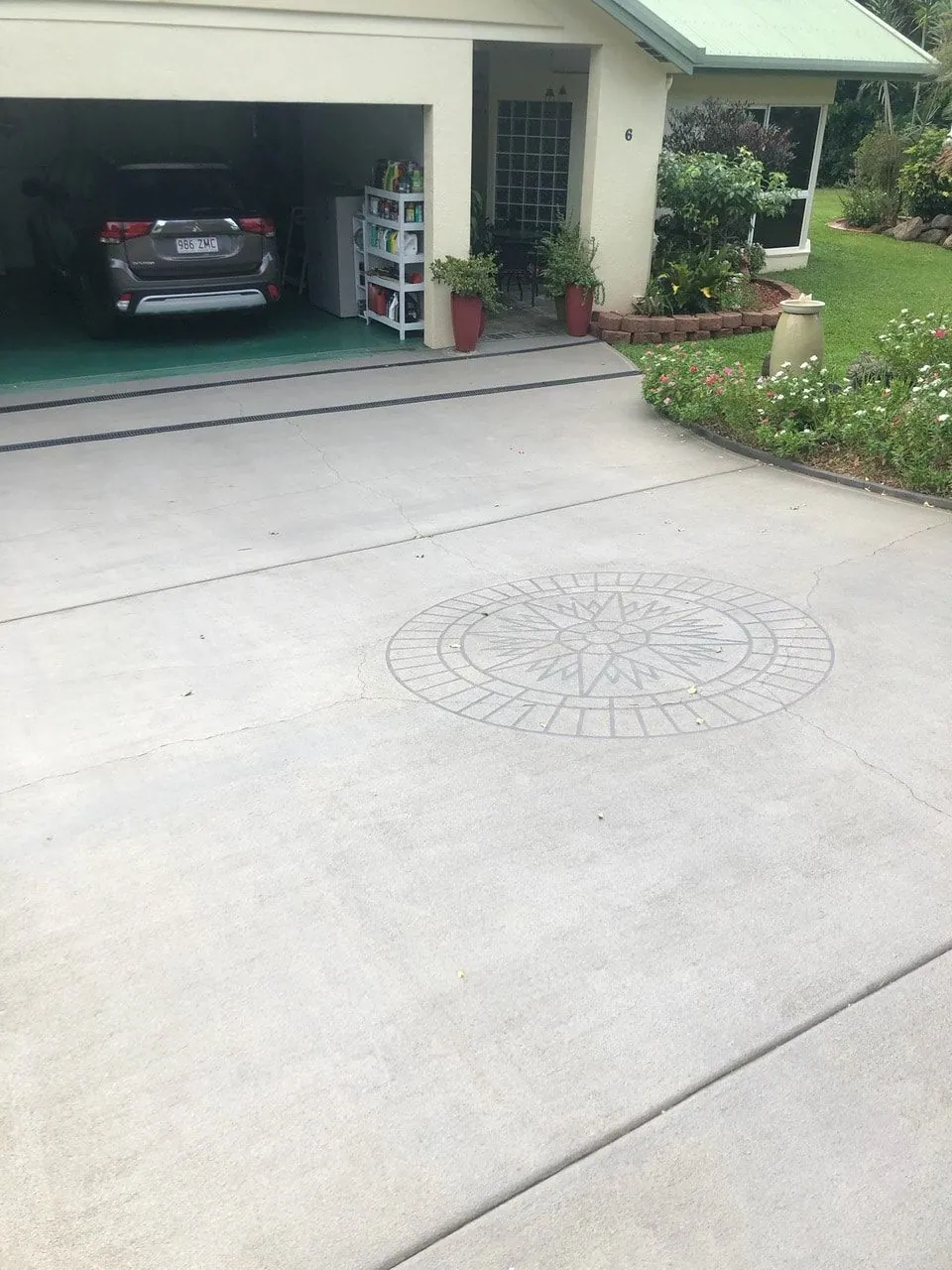 Concrete driveway in Cairns with a decorative painted finish
