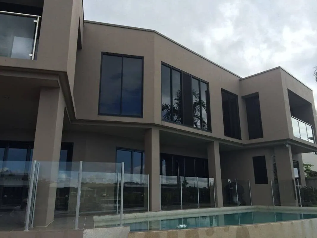 Modern two-storey home in Cairns with a pool after exterior repainting